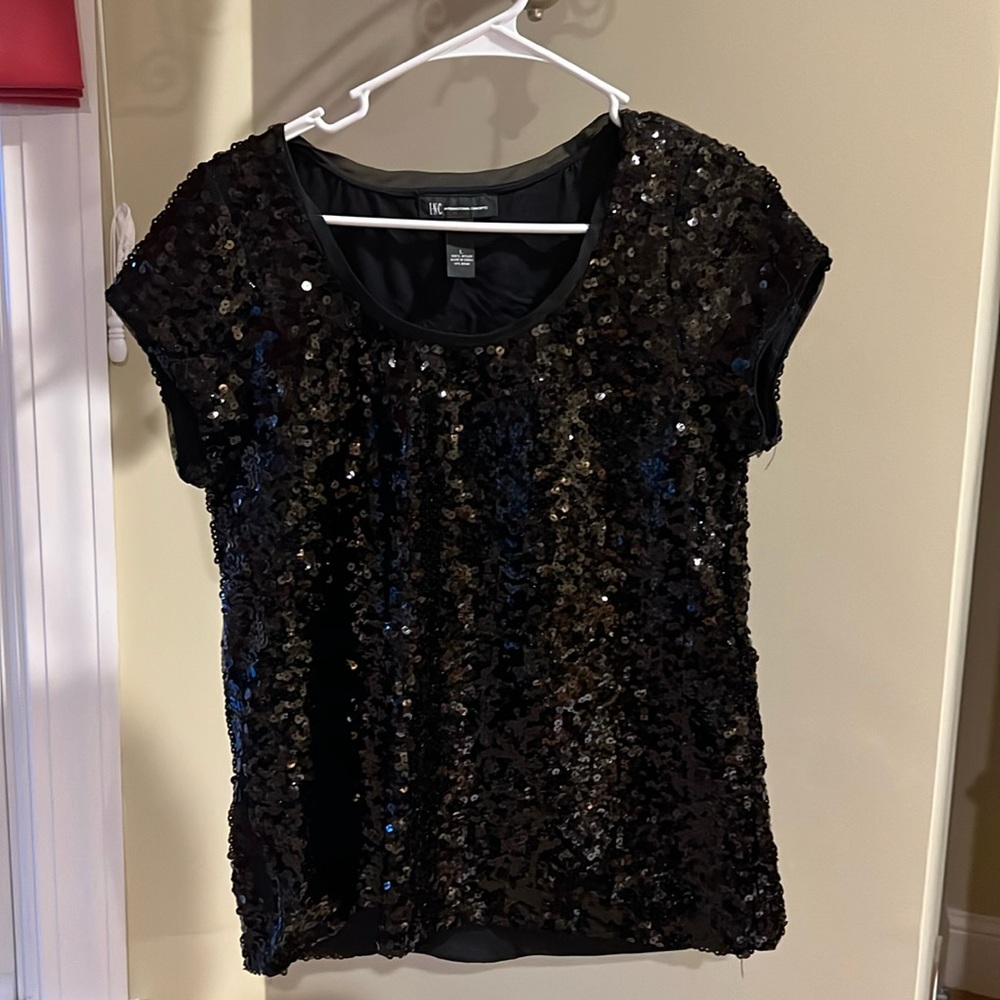 Beautiful Black sequined tunic top !! Great holiday top !!